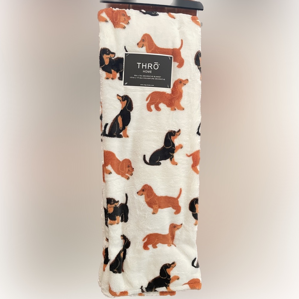 Dachshund themed throw blanket.